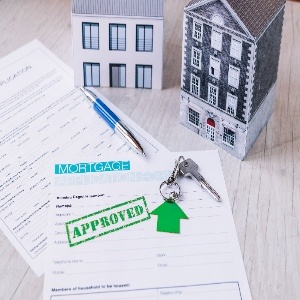 new house keys composition with papers